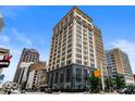 Low angle view of a commercial building with a clear blue sky at 110 Washington St # 301, Indianapolis, IN 46204