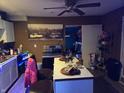 Open kitchen featuring a center island with barstool seating, and stainless steel appliances at 1343 W 33Rd St, Indianapolis, IN 46208