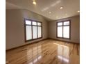 Bright bedroom featuring vaulted ceilings, recessed lighting, and hardwood floors with multiple windows at 1394 Cherry Tree Rd, Avon, IN 46123