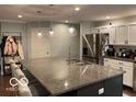 Beautiful kitchen featuring island with granite countertop at 2335 Durham Dr, Indianapolis, IN 46220