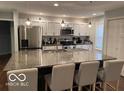Modern kitchen featuring granite countertops and stainless steel appliances at 2335 Durham Dr, Indianapolis, IN 46220