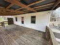 Expansive back deck offering ample outdoor space for relaxation and entertainment with a wooden railing at 2975 High Rock Dr, Martinsville, IN 46151