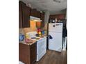 A kitchen featuring updated appliances and ample counter space for cooking and food preparation at 3101 N Temple Ave, Indianapolis, IN 46218