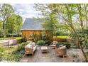 Cozy outdoor patio with comfortable seating, perfect for relaxing at 4151 N Pennsylvania St, Indianapolis, IN 46205