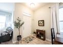 Welcoming entryway features a white front door, stylish decor, and natural light at 1099 Valentine Ln, Carmel, IN 46032