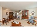 Open living room featuring classic furnishings and hardwood accents at 14195 Holly Berry Cir, Fishers, IN 46038