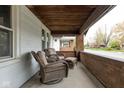Relaxing front porch with comfortable wicker chairs and a cozy atmosphere at 1116 N Linwood Ave, Indianapolis, IN 46201