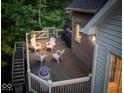 Inviting outdoor deck with comfortable seating and a grill, perfect for entertaining guests at 12304 Ridgeside Rd, Indianapolis, IN 46256