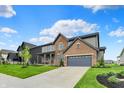 Beautiful home with a well-maintained lawn and an attached two-car garage. Plenty of curb appeal! at 132 Oakhurst Way, Westfield, IN 46074