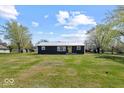 Charming single story home with large yard and metal roof at 415 Elm Ave, Sheridan, IN 46069