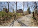 Secluded wooded lot featuring charming home and separate smaller dwelling at 701 E Main St, Westfield, IN 46074