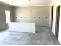A modern room with recessed lighting and natural light offers a spacious layout to create your dream living space at 792 Oakleaf Dr, Greenfield, IN 46140