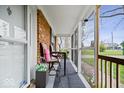 Inviting screened-in porch featuring comfortable seating, stylish decor, and a relaxing outdoor ambiance at 8180 E County Road 400 N, Brownsburg, IN 46112