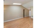 Spacious living room featuring wood floors, neutral walls, recessed lighting, and a large entryway at 1579 Winding Creek Trl, Brownsburg, IN 46112