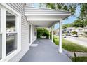Spacious front porch perfect for relaxing and enjoying the neighborhood views at 3902 N Capitol Ave, Indianapolis, IN 46208