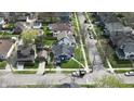 Aerial view of the blue home in a lovely neighborhood at 3967 N Park Ave, Indianapolis, IN 46205