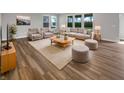 Inviting living room with a cozy seating area, lots of light, and stylish decor at 5267 Chambers Ct, McCordsville, IN 46055