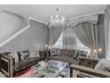 Elegant living room featuring plush seating, decorative lighting, and refined decor for a sophisticated ambiance at 8442 Averly Park Dr, Indianapolis, IN 46237