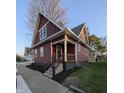 Beautiful two-story home with a front porch and inviting curb appeal in a suburban neighborhood at 128 W Walnut St, Lebanon, IN 46052