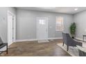 Bright living room features hardwood floors, and natural light, creating a welcoming atmosphere at 2326 Guilford Ave, Indianapolis, IN 46205