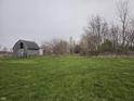 A large backyard area with an old shed at 1152 W 375 N, Anderson, IN 46011