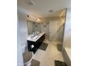 Bathroom featuring a double sink vanity with a white countertop and neutral flooring at 11726 Zander Dr, Indianapolis, IN 46235