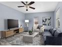 Cozy living room featuring hardwood floors, a modern sofa, and a stylish entertainment center at 1739 N Alton Ave, Indianapolis, IN 46222