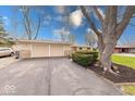 Spacious driveway with a two-car garage at 3303 Busy Bee Ln, Indianapolis, IN 46227