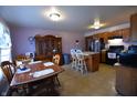 Spacious kitchen with a functional island, stainless steel appliances, and wood cabinets at 419 W Osage St, Greenfield, IN 46140