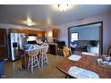 Open-concept kitchen flowing into the living area, featuring an island and modern appliances at 419 W Osage St, Greenfield, IN 46140