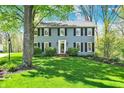 Inviting two-story home with neatly landscaped front yard at 70 Williamsburg Ct, Zionsville, IN 46077