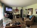 Inviting living room features comfortable seating and an entertainment center at 712 E Mckenzie Rd, Greenfield, IN 46140