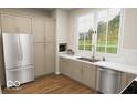 A kitchen featuring stainless steel appliances and ample cabinet space at 8083 Easton Ln, Zionsville, IN 46077