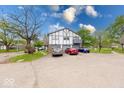 Three-car garage provides ample parking and storage for this well-situated home at 9855 Haven Ct, Indianapolis, IN 46235
