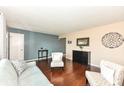 Comfortable living room showcasing hardwood floors, contemporary furniture, and stylish decor at 143 Beechview Ln, Indianapolis, IN 46217