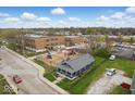 Aerial view of the home in close proximity to the nearby school and playground at 2349 Indianapolis Ave, Indianapolis, IN 46208
