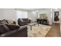 Inviting living room boasts neutral walls, modern furniture, and stylish decor at 4464 Four Seasons Cir, Indianapolis, IN 46226