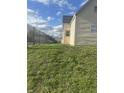 Backyard view featuring a fence and green space at 818 W 27Th St, Indianapolis, IN 46208