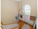 Magnificent foyer with soaring ceilings, a striking chandelier, and an abundance of natural light at 14491 Jeremy Dr, Carmel, IN 46033