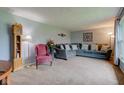 Inviting living room features a comfortable gray sectional sofa and classic decor at 4013 Colonial Dr, Anderson, IN 46012