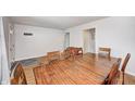 Large dining room with a hardwood floors and a view of the doorway into another room at 5541 S County Road 150 E, Clayton, IN 46118