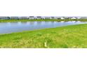 Scenic view of the pond with houses lining the back at 8163 Dewberry Ln, Pendleton, IN 46064