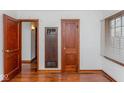Image of hardwood floors and neutral walls in the home's living room at 1726 N Euclid Ave, Indianapolis, IN 46218