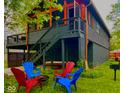 Outdoor area with seating arrangement and lawn provides space for relaxation and entertainment at 256 Riverwood Dr, Noblesville, IN 46062