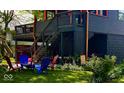 Outdoor area with seating arrangement and lawn provides space for relaxation and entertainment at 256 Riverwood Dr, Noblesville, IN 46062