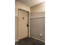 Cozy hallway featuring neutral walls and a sturdy door for added security at 3127 E 52Nd St # C, Indianapolis, IN 46205