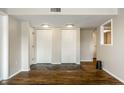Bright room with hardwood floors and storage closets, offers a clean and versatile living area at 3127 E 52Nd St # C, Indianapolis, IN 46205