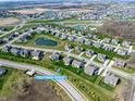 Enjoy the expansive community views from your new home featuring lush green spaces and picturesque ponds at 3997 Spylaw Rd, Bargersville, IN 46106