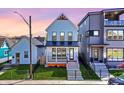 Charming two-story home with modern farmhouse design and inviting front porch at 1317 Spann Ave, Indianapolis, IN 46203