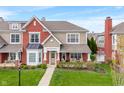 Inviting two-story home showcasing a combination of brick and siding accents at 1352 Middlebury Dr, Westfield, IN 46074